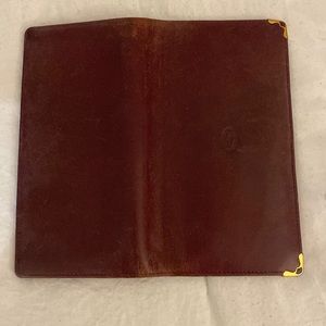 Check book wallet must de Cartier color byrgundy